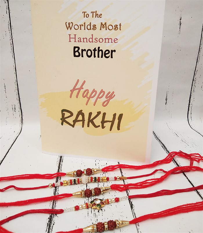 Elegant Set of Rakhis with Handcrafted Greeting Card