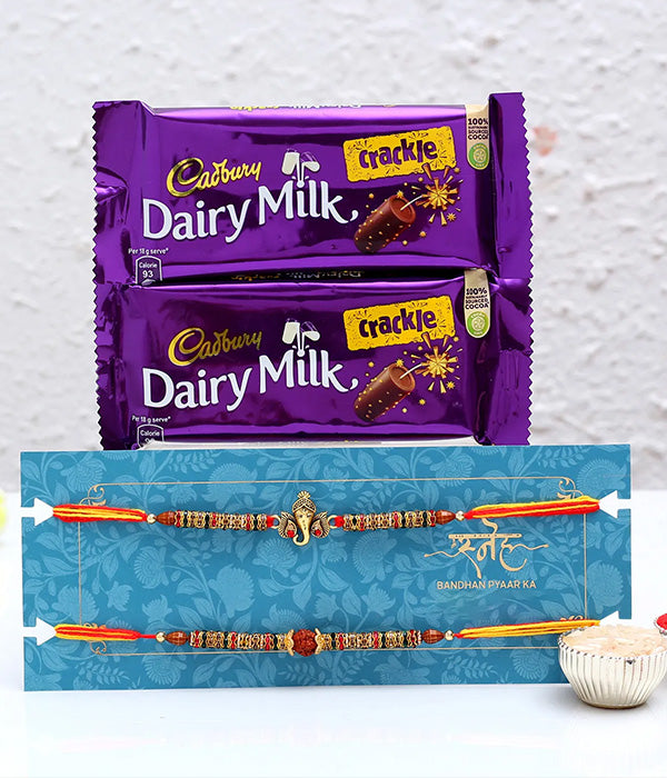 Set of 2 auspicious rakhis with cadbury crackle chocolates